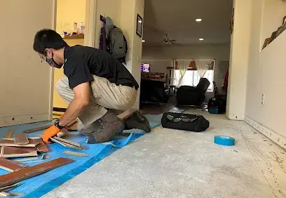 Restoration tech removing water-damaged flooring in Dublin, CA