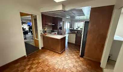 Ceiling opened above a kitchen to dry a leak in Dublin, CA