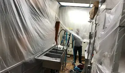 Plastic containment set up during commercial water damage cleanup in Dublin, CA