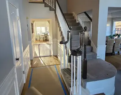 Floor protection and drying gear on the stairs of a Dublin, CA townhome