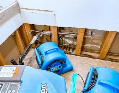 Air movers drying an opened wall cavity in a Dublin, CA home