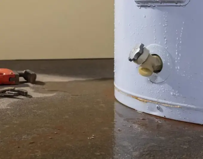 Water pooled on the floor around a leaking water heater in Dublin, CA